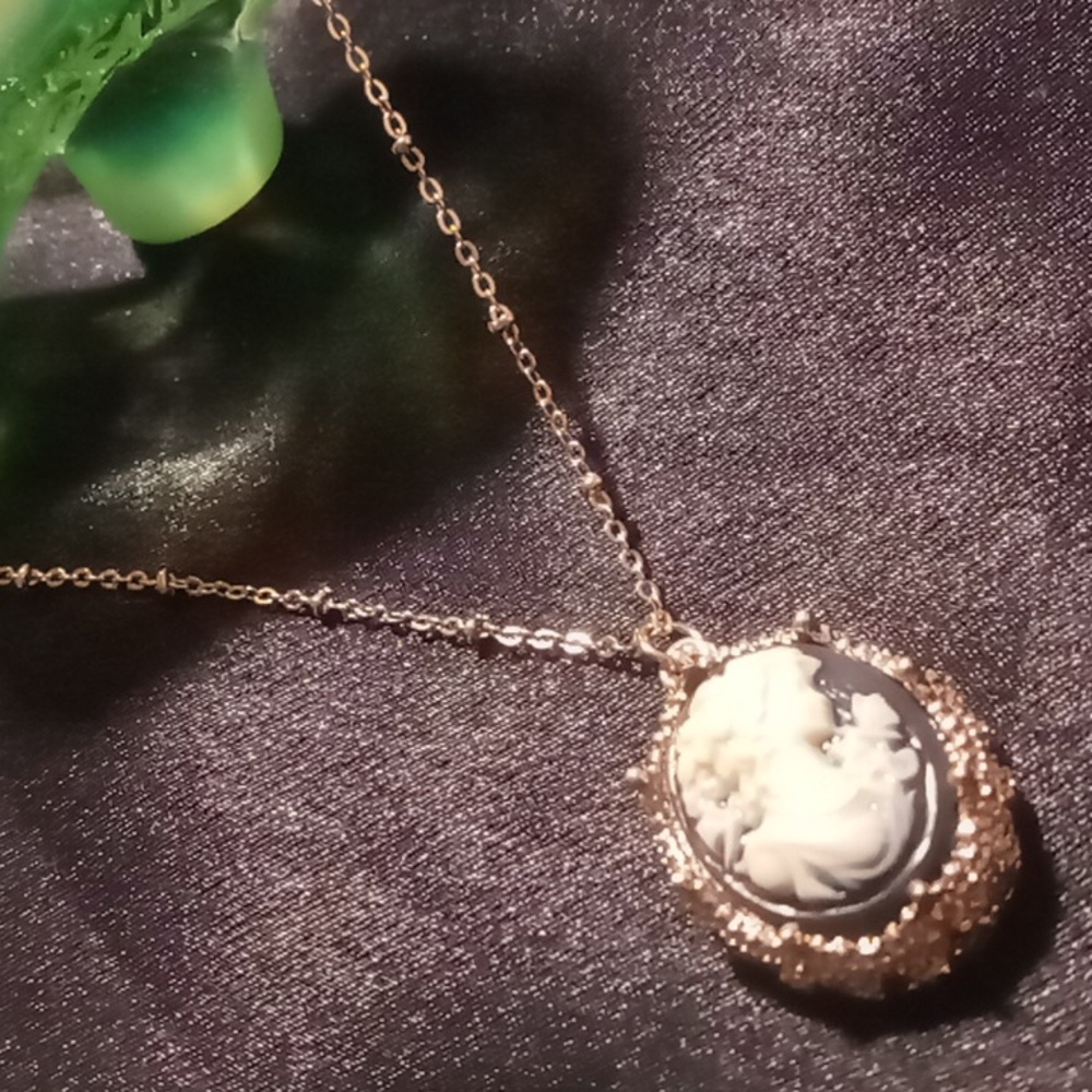 Blackened Cameos with a beaded gold wash chain 16 -18 extendable. Vintage style